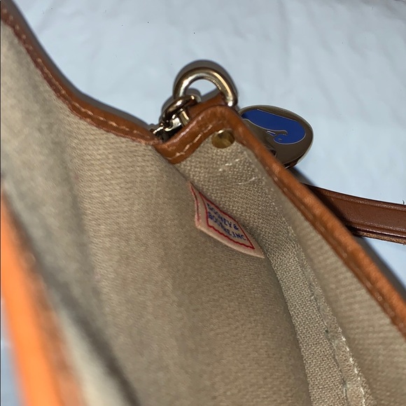Dooney & Bourke tan & brown button flap wristlet - Picture 5 of 8